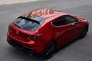 Фото Mazda Три Хэтчбэк - интерьер и экстерьер