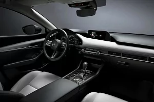 Фото Mazda Три Хэтчбэк - интерьер и экстерьер